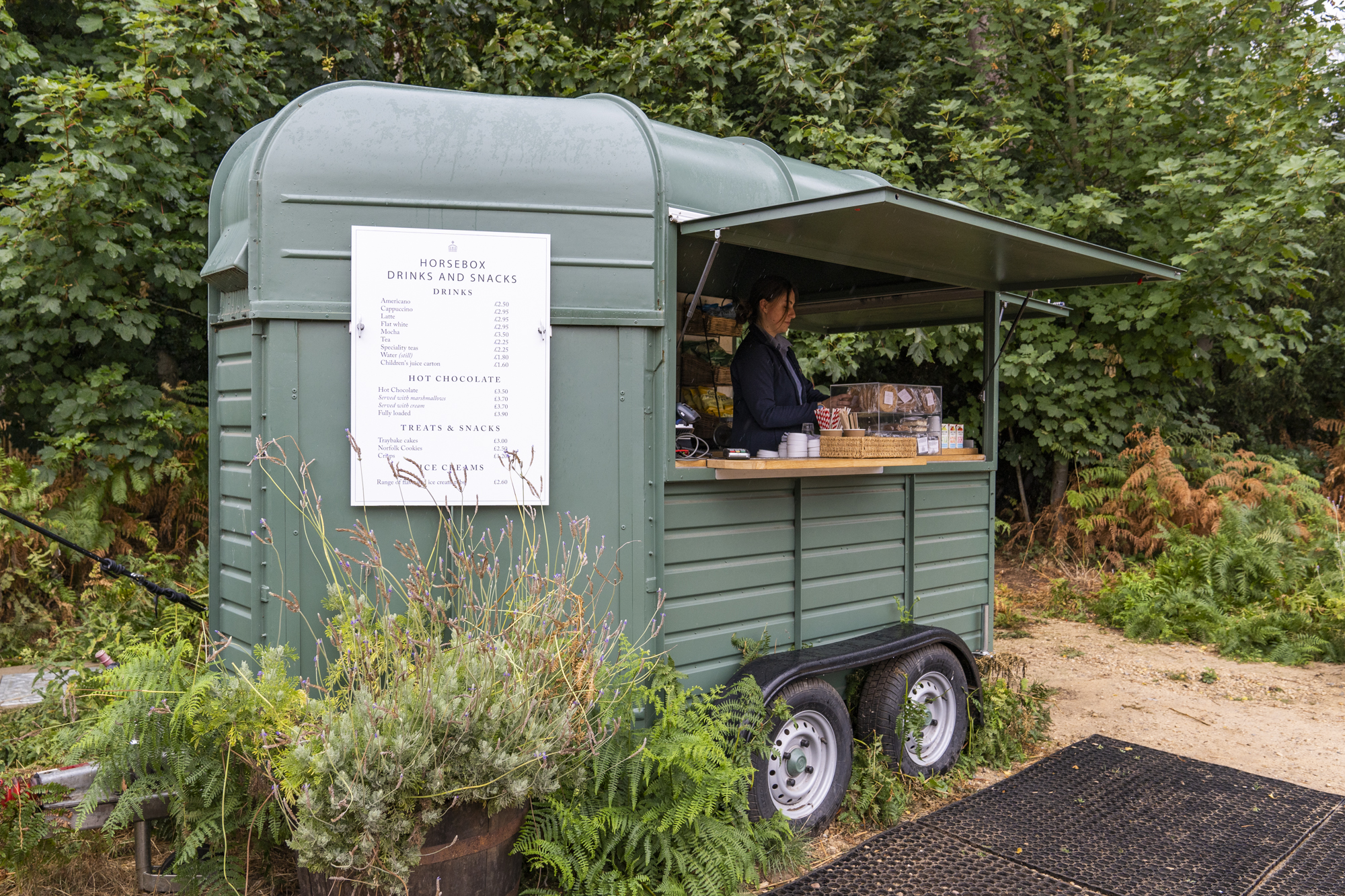 An image of a horsebox selling drinks and cakes